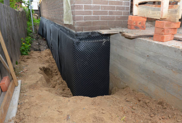 Happy homeowners after waterproofing job in Viewtown